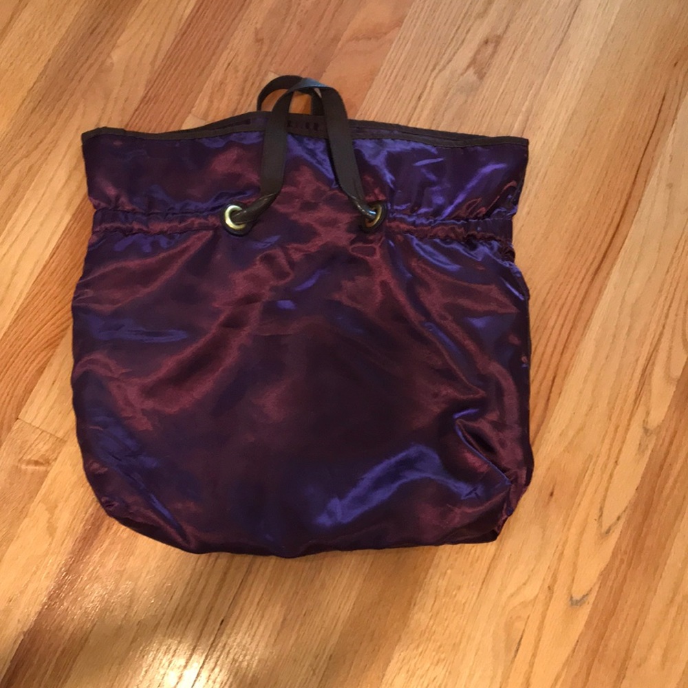 Purple bag.  Silk-like material.